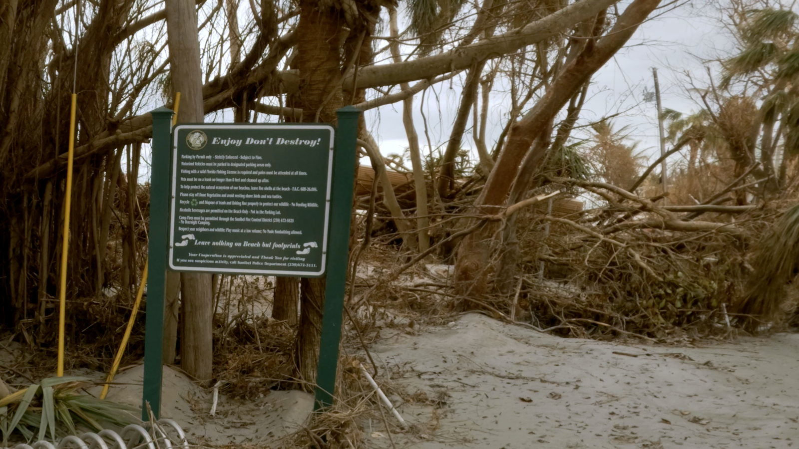 Hurricane Ian Didn't Get The Memo - Sign says Enjoy Don't Destroy
