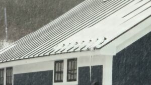 Snow Guards Protecting the Entry Walkway Below
